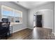 Bright office featuring an entryway, a large window with natural light, and wood-look flooring at 1875 Loggerhead Dr, Lancaster, SC 29720