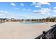 Community pool with spacious deck, lifeguard chairs, fencing, and ample community space at 1875 Loggerhead Dr, Lancaster, SC 29720