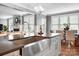 Bright kitchen island with stainless steel sink, with easy access to the dining and living areas at 2305 Flintwood Ln, Charlotte, NC 28226