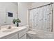 Clean bathroom featuring a white vanity, toilet, and bathtub with a patterned shower curtain at 242 Tradition Way, Rock Hill, SC 29732