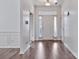 Inviting foyer with hardwood floors, neutral paint, and natural light streaming through the front door at 242 Tradition Way, Rock Hill, SC 29732