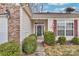 Close-up of a front entrance of a charming home with a decorative wreath and seasonal decor at 242 Tradition Way, Rock Hill, SC 29732
