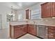 Well-equipped kitchen with stainless steel appliances and a breakfast bar overlooking the dining area at 242 Tradition Way, Rock Hill, SC 29732