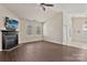Spacious living room with fireplace, ceiling fan, and hardwood floors at 242 Tradition Way, Rock Hill, SC 29732