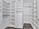 This walk-in closet is spacious with shelving and drawers at 242 Tradition Way, Rock Hill, SC 29732