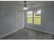 Comfortable bedroom with dual windows, new flooring, and a closet, all freshly painted at 245 College E Ave, Shelby, NC 28152