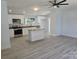 Spacious kitchen with granite countertops, white cabinets, and stainless steel appliances at 245 College E Ave, Shelby, NC 28152
