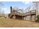 Exterior of home featuring a large deck with stairs leading to the backyard at 262 Vermont Dr, Stanley, NC 28164