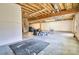 Large unfinished basement with exposed duct work and cinder block walls at 28926 Hartsell Rd, Albemarle, NC 28001