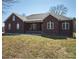 Charming brick home with a welcoming front porch and well-maintained lawn at 28926 Hartsell Rd, Albemarle, NC 28001