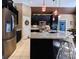 Modern kitchen with stainless steel appliances, granite counters, black cabinetry and a large central island at 28926 Hartsell Rd, Albemarle, NC 28001