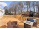 Spacious wooden deck with outdoor seating and a cozy fire pit, perfect for entertaining at 3017 Laurelwood Dr, Matthews, NC 28105