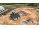 Aerial view of a new clubhouse and pool being built, showcasing the layout and surroundings at 3105 Beacon Heights Rd, Indian Land, SC 29707