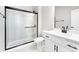 Modern bathroom includes glass-enclosed shower, sleek fixtures, and stylish vanity with clean lines at 3105 Beacon Heights Rd, Indian Land, SC 29707
