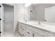 Bathroom featuring double sink vanity with elegant countertops and cabinetry, plus a well-lit mirror at 3105 Beacon Heights Rd, Indian Land, SC 29707