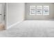 Bedroom featuring plush carpet flooring, neutral paint color, and bright natural light at 3105 Beacon Heights Rd, Indian Land, SC 29707