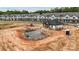 Community pool under construction with modern homes in the background at 3105 Beacon Heights Rd, Indian Land, SC 29707