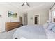 Main bedroom featuring a tv, dresser, mirror and natural light at 3113 Winged Teal Ct, Belmont, NC 28012