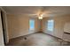 Bedroom featuring carpet, neutral walls, ceiling fan and two windows for ample light at 350 Brawley Rd, Cleveland, NC 27013