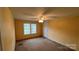 Bedroom with carpet, neutral walls, ceiling fan, and window for ample light at 350 Brawley Rd, Cleveland, NC 27013