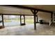 Covered carport area, offering protection for vehicles and outdoor storage at 350 Brawley Rd, Cleveland, NC 27013