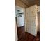 Hallway with built-in storage leads to the front door and other areas of the home at 350 Brawley Rd, Cleveland, NC 27013