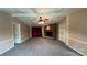 Cozy living room showcases a brick fireplace, neutral walls, and ample space for relaxation at 350 Brawley Rd, Cleveland, NC 27013