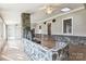 Cozy living room showcasing stone accent wall with fireplace and ample natural light at 3607 Austin Rd, Monroe, NC 28112