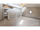 Spacious living room with vaulted ceilings, skylights, and a neutral color palette at 3607 Austin Rd, Monroe, NC 28112