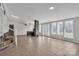 Expansive living area with stone fireplace and large windows offering natural light at 3607 Austin Rd, Monroe, NC 28112