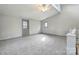 Loft featuring vaulted ceilings, a skylight, and neutral walls and carpeting at 3607 Austin Rd, Monroe, NC 28112