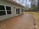 Backyard deck with light green siding, perfect for outdoor entertaining at 3667 Travertine Dr, Lancaster, SC 29720