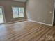 Bright bedroom features a large window and sliding glass doors to let in plenty of natural light at 3667 Travertine Dr, Lancaster, SC 29720