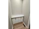 A small laundry room with white counter, cabinets, and new floors at 3667 Travertine Dr, Lancaster, SC 29720