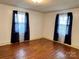 Bedroom featuring hardwood floors and natural light streaming through windows at 3672 Nc Hwy 127 Hwy, Hickory, NC 28602