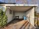 Carport with brick latticework, gravel bed and overhead lighting at 3672 Nc Hwy 127 Hwy, Hickory, NC 28602
