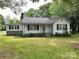 Traditional-style home featuring a cozy front porch, clean white siding and classic black shutters at 3672 Nc Hwy 127 Hwy, Hickory, NC 28602