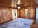 Spacious living room showcases beautiful wood paneling, hardwood floors, and open access to other rooms at 3672 Nc Hwy 127 Hwy, Hickory, NC 28602