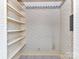 Walk-in pantry features shelving and floral wallpaper, offering storage and character at 4046 Rhynland Dr, Sherrills Ford, NC 28673