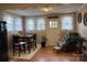 Charming dining area featuring hardwood floors, bright windows, and a cozy breakfast nook, perfect for gatherings at 412 E Ross Grove Rd, Shelby, NC 28150