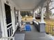 Spacious covered front porch offers cozy seating and relaxing outdoor space at 412 E Ross Grove Rd, Shelby, NC 28150