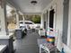 Charming front porch featuring inviting seating and decorative gray columns at 412 E Ross Grove Rd, Shelby, NC 28150