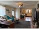 Cozy living room with ample natural light, neutral decor, and open access to the kitchen at 412 E Ross Grove Rd, Shelby, NC 28150