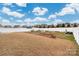 Large backyard with a privacy fence and well manicured garden beds at 4427 Allenby Pl, Monroe, NC 28110
