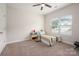 Bedroom with a ceiling fan and view of the neighborhood at 4427 Allenby Pl, Monroe, NC 28110