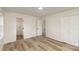 Spacious bedroom with closet and modern light-colored hard wood floors at 510 Colony Acres Dr, Charlotte, NC 28217