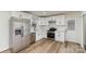 Modern kitchen features stainless steel appliances, white cabinets, and stylish hardware at 510 Colony Acres Dr, Charlotte, NC 28217
