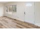 This living room has neutral walls and flooring, with natural light coming in through large windows at 510 Colony Acres Dr, Charlotte, NC 28217