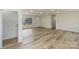 Spacious and bright living room with large windows and modern light-colored hard wood floors at 510 Colony Acres Dr, Charlotte, NC 28217
