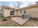 Backyard patio area, ready for entertaining, sits at the back of the home at 515 Culloden Ct, Charlotte, NC 28214
